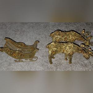 Gold wire mesh sleigh with 2 reindeer.